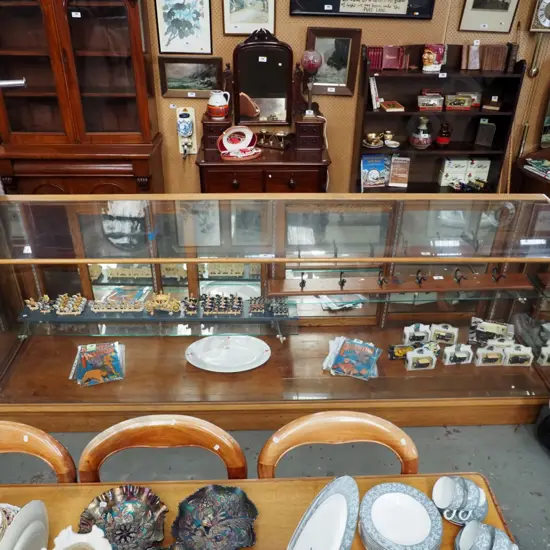 vintage very large glazed oak shop counter display cabinet with adjustable glass shelves, 4 sliding doors - scratches to