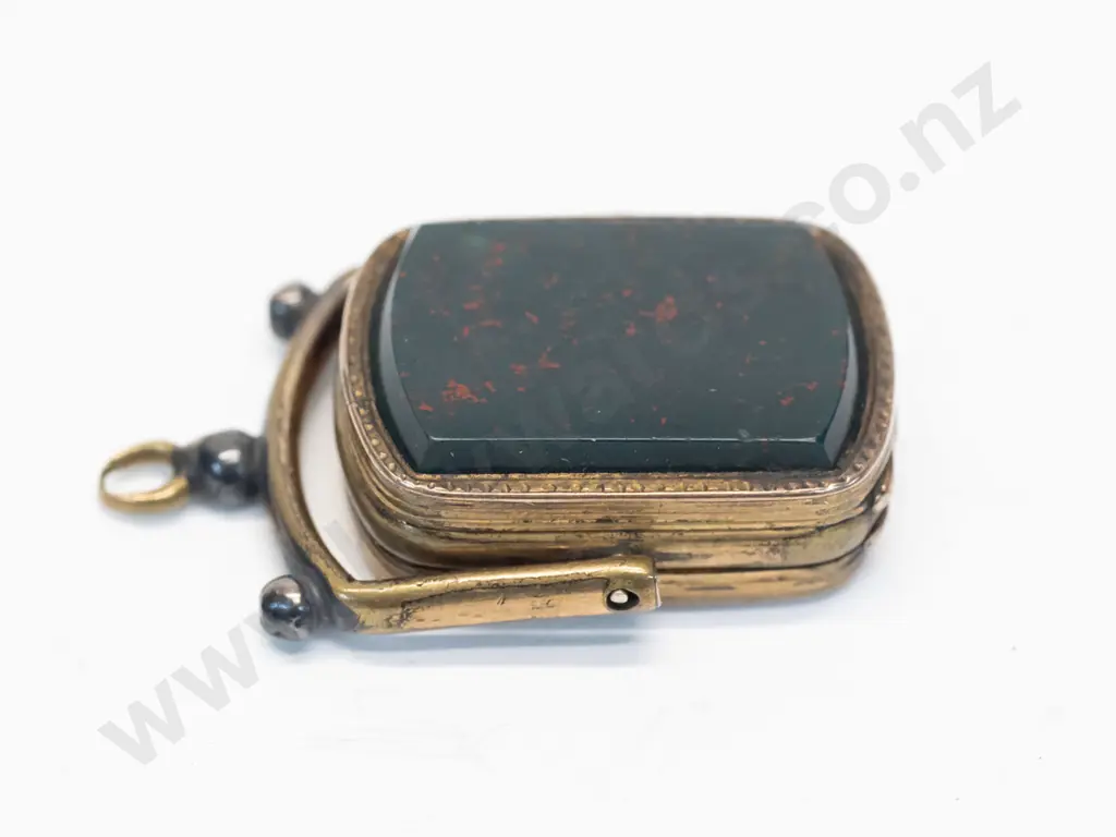 locket with dark stone on swing hinge no chain Image 1++