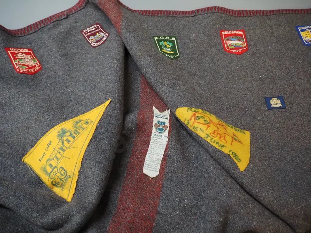 wool girl guide's blanket with assorted patches, one dated 1980 L-2080 W-1430 Image 1++