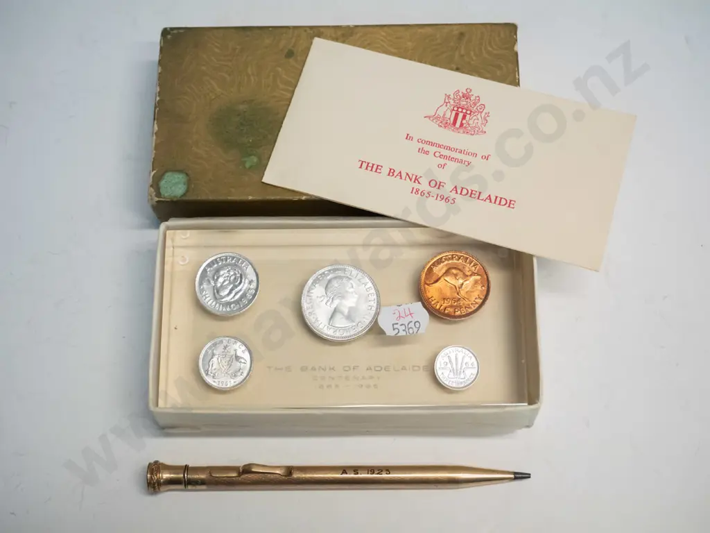 cased 'The bank of Adelaide' centenary 1865-1965 coin set & gold coloured pen stamped AS 1925 Image 1++