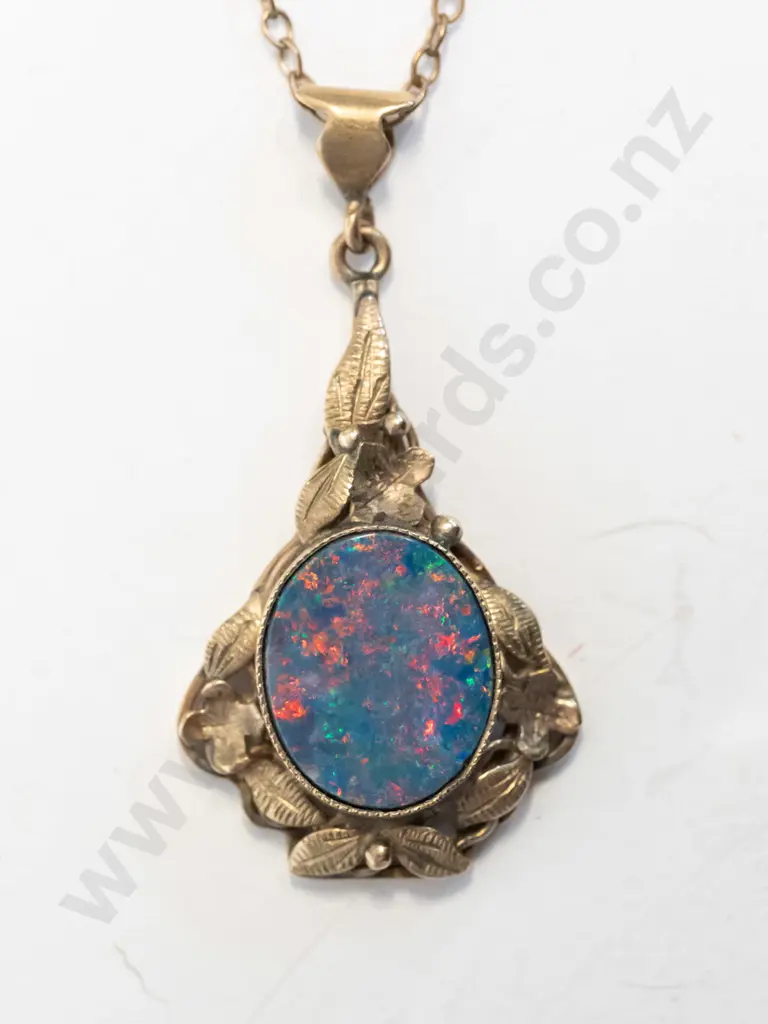 9ct pendant with mottled stone stamped Image 1++