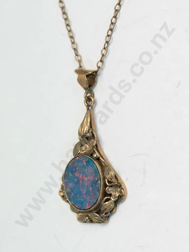 9ct pendant with mottled stone stamped Image 1++