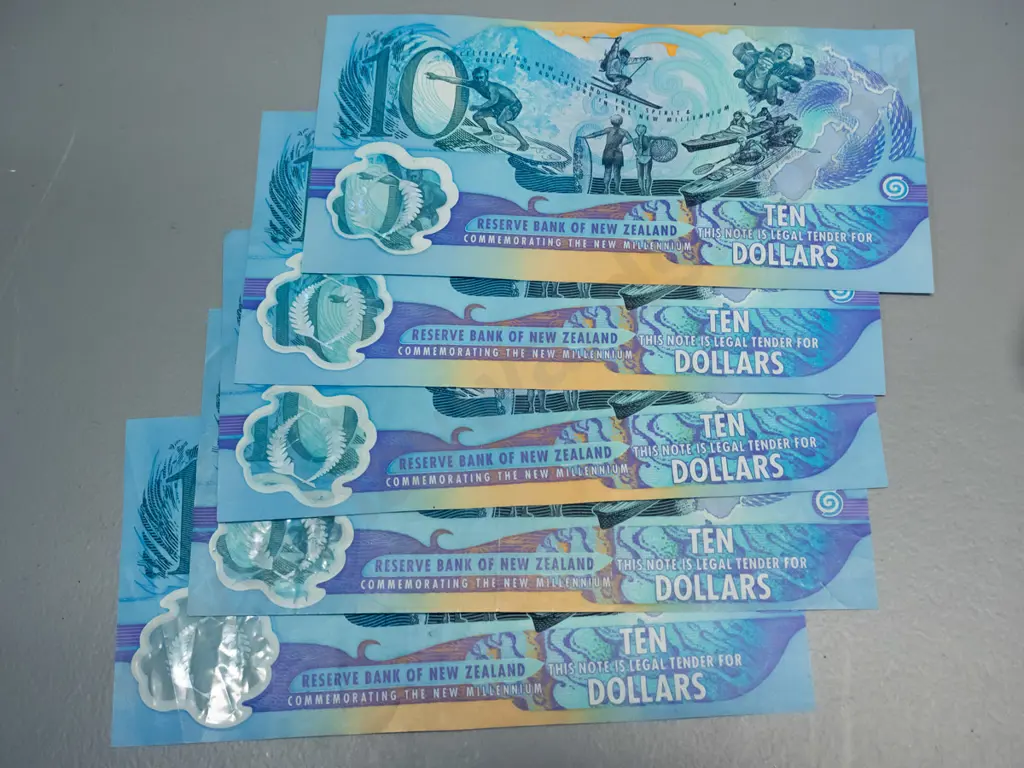 New Zealand bank notes - 5 Millennium $10 notes and assorted $1, $2, and $5 - all in used condition Image 1++