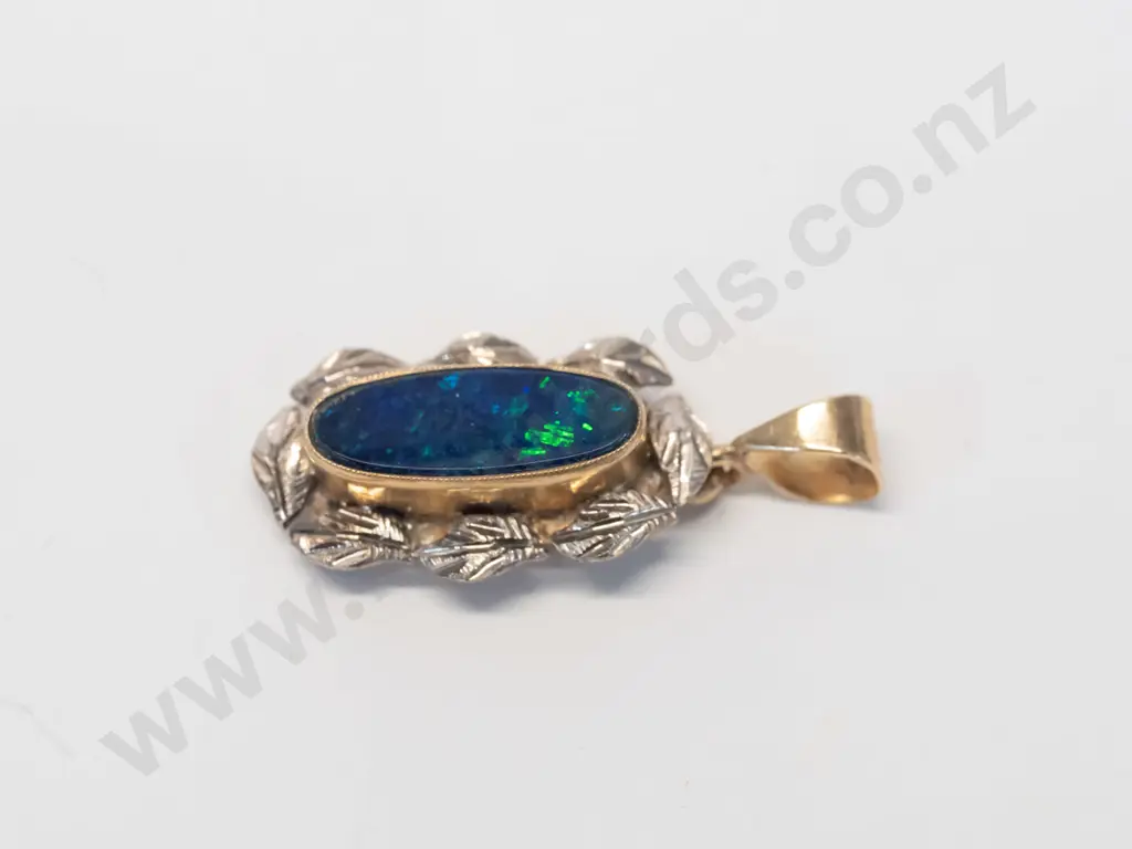 small green/blue pendant stamped 10k no chain Image 1++