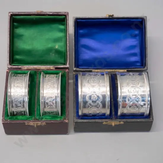 2 cased pairs of sterling silver napkin rings with etched patterns