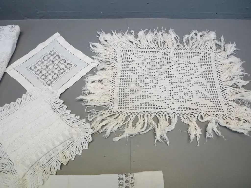 assorted vintage hand-stitched needlework - 2 supper cloths, handkerchief pouch and 2 mats Image 1++