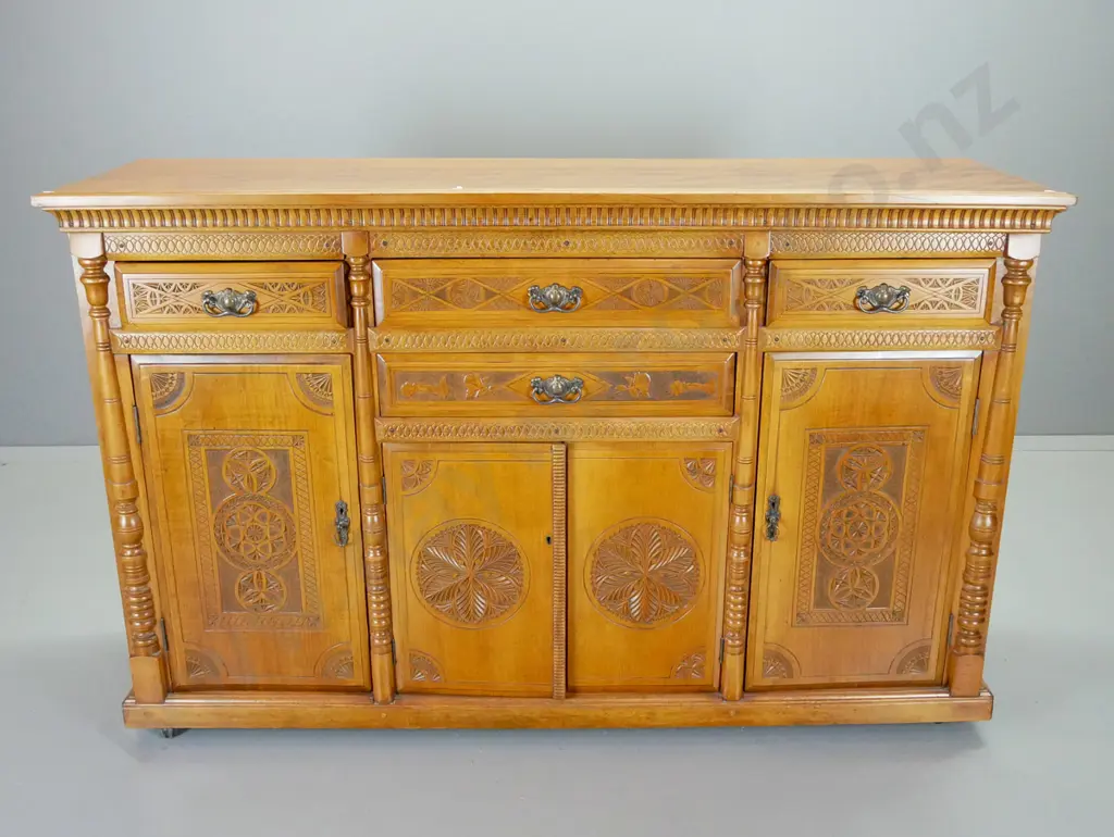 antique kauri sideboard, circa 1890, 4 doors and 4 drawers w/ mission-carved fronts. original brass handles, with key Image 1++