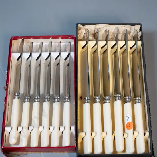 2 boxed sets of Cutlass bone-handled knives - 6 dinner & 6 bread & butter