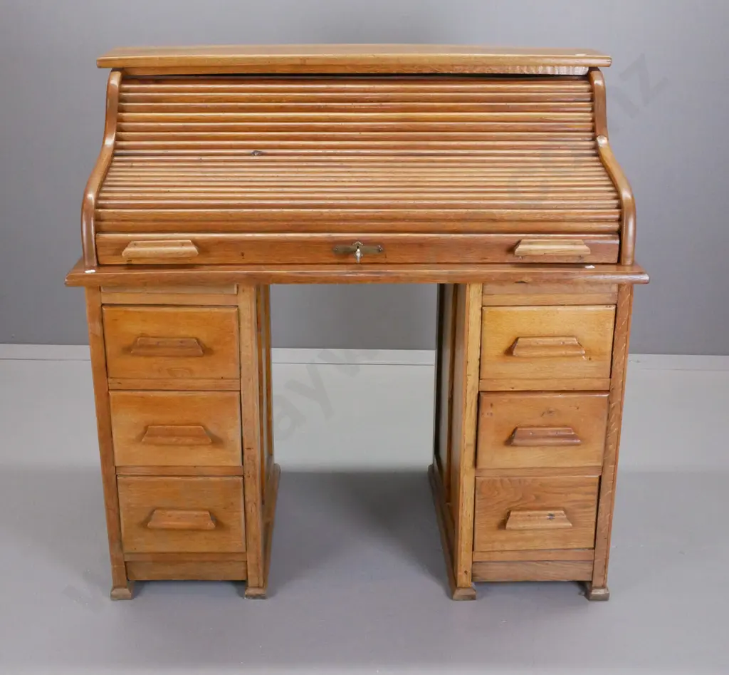 vintage oak double-pedestal roll-top desk with 6 drawers, pigeonholes & 2 small drawers inside, one missing a knob Image 1++