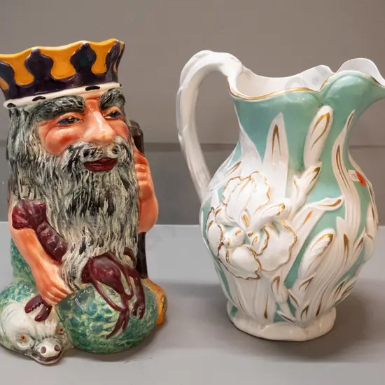 large Shorter's Father Neptune toby jug H-270 and a teal, white & gold iris motif jug