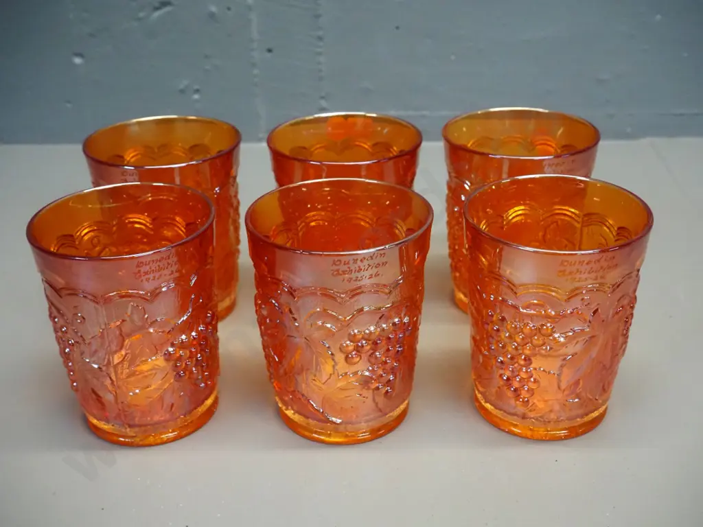 set of 6 marigold colour carnival glass grape pattern water glasses, each engraved with Dunedin Exhibition 1925-26 Image 1++
