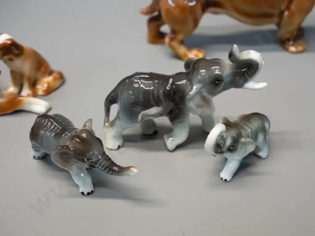 assorted small fine porcelain animal figurines - dogs, birds, elephant, etc. - dachshund is H-65 L-120 Image 1++