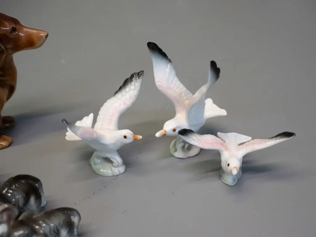 assorted small fine porcelain animal figurines - dogs, birds, elephant, etc. - dachshund is H-65 L-120 Image 1++