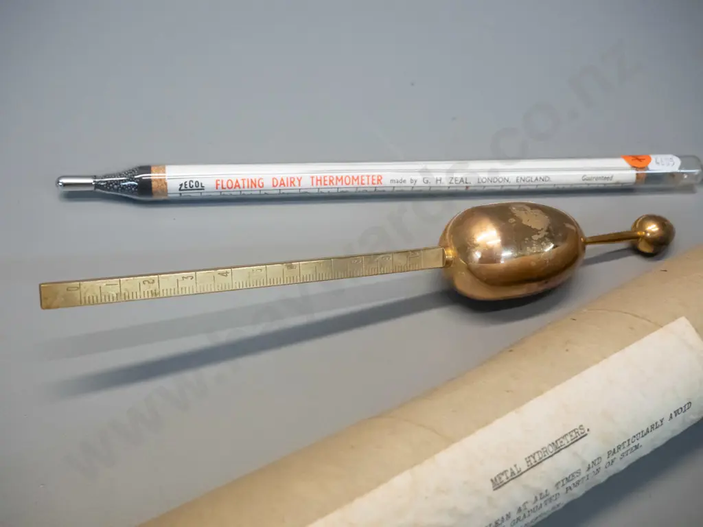 "Zeal" English metal Hydrometer and a glass cased floating dairy thermometer L-290 Image 1++