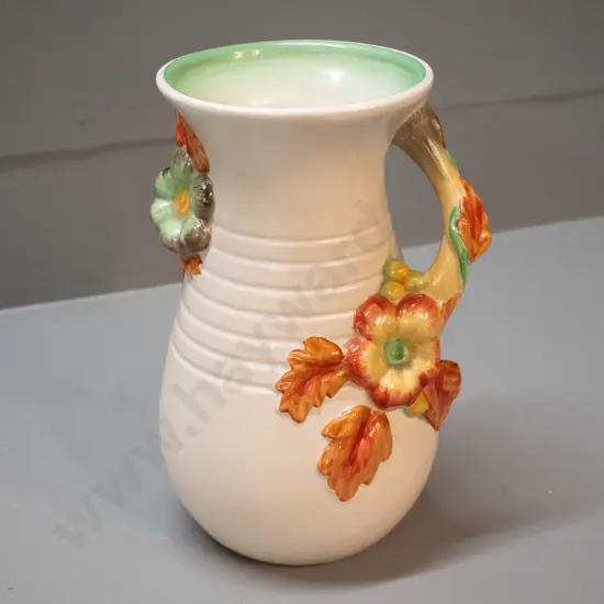 Clarice Cliff Newport Pottery vase with floral handle H-230