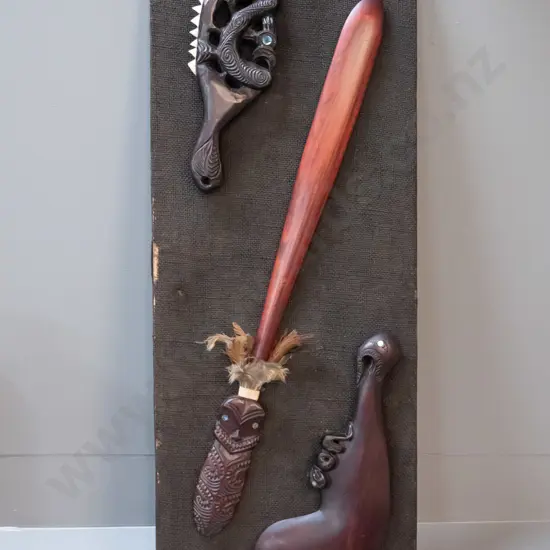 Maori motif wall display - timber items mounted on hessian covered background H760 W280 - some