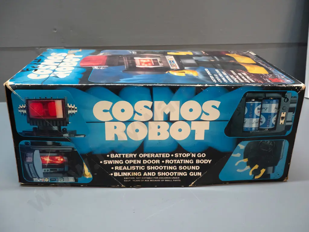 Cosmos battery powered toy robot in original box - untested but battery compartment is clean. H-310 W-180 Image 1++