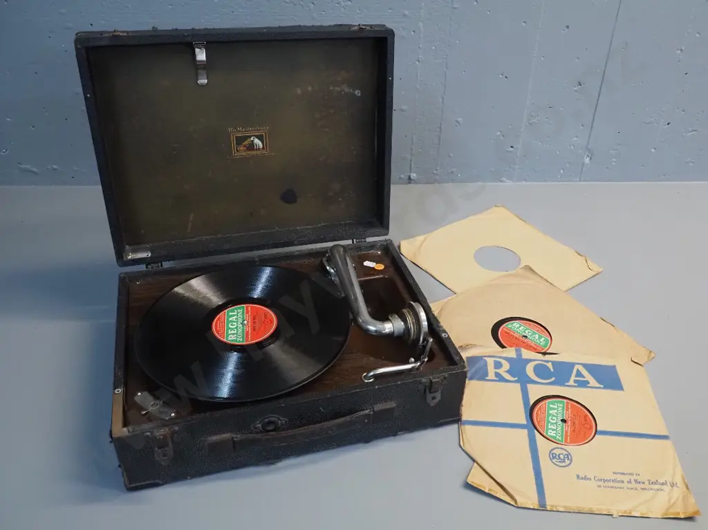 vintage HMV portable wind-up gramophone with 3 Zonohpone Australia records - working but some wear & damage to case, Image 1++