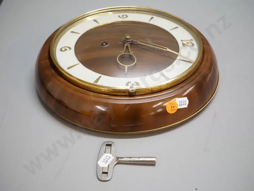 Schatz metal cased wall clock with brass trim, faux wood finish, with key, D-230 - not working, spring broken Image 1++