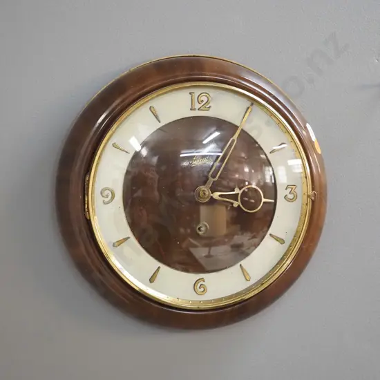 Schatz metal cased wall clock with brass trim, faux wood finish, with key, D-230 - not working, spring broken