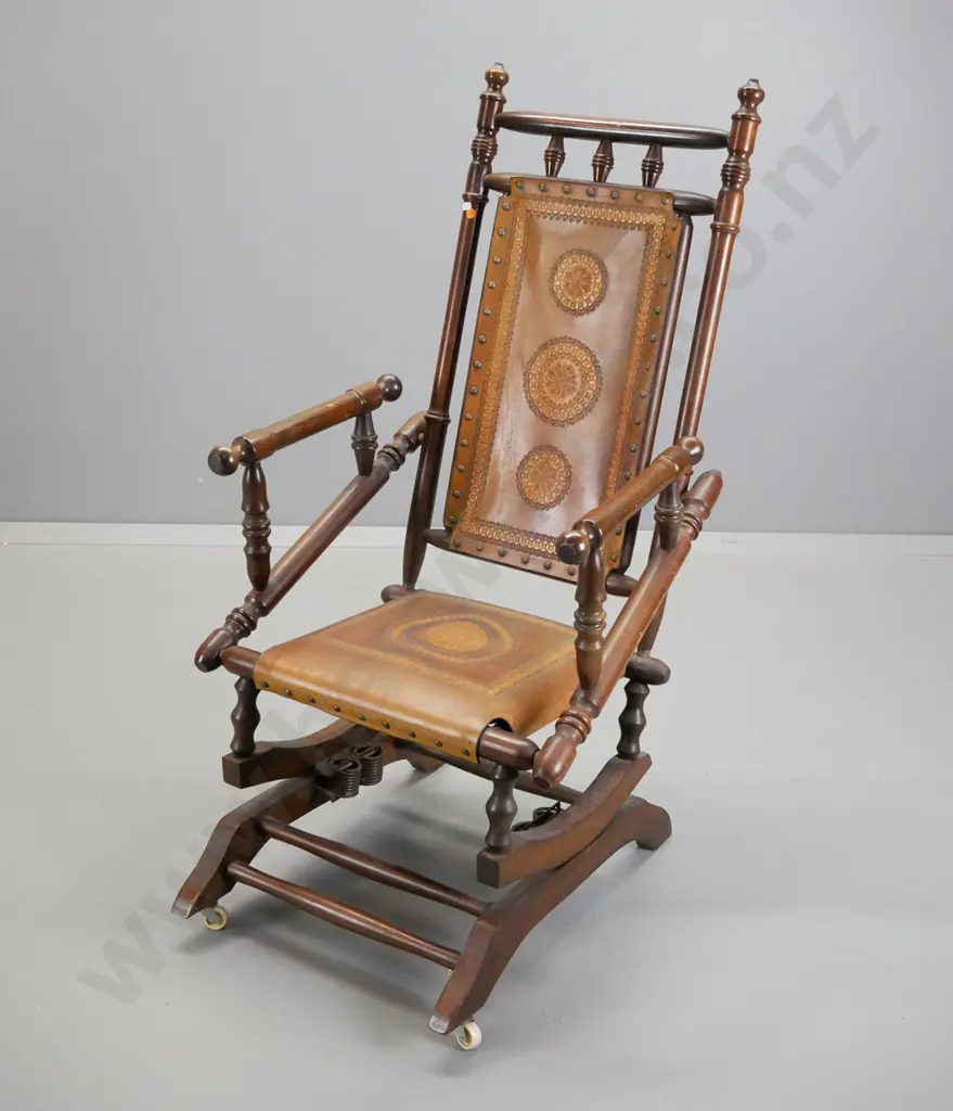 Dexter cotton reel rocking chair with tooled leather seat & back, on casters - some rubbing & scuffing to polish Image 1++