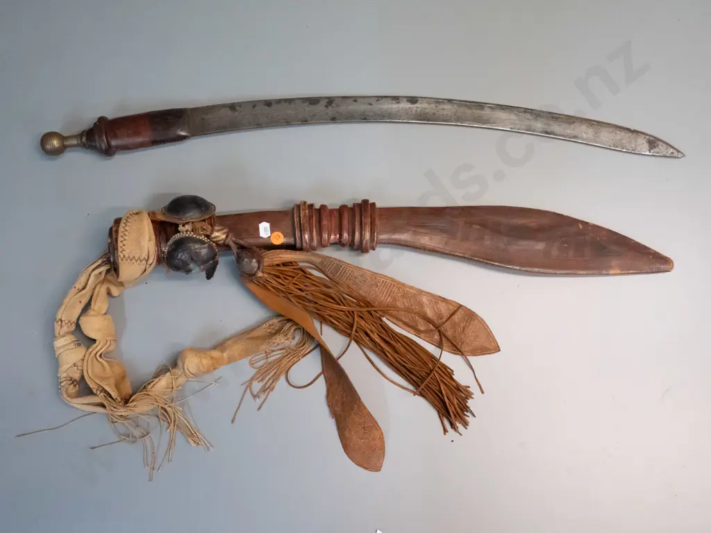vintage scimitar style sword and leather sheath with brass cap, woven fabric straps - corrosion to blade and wear to Image 1++