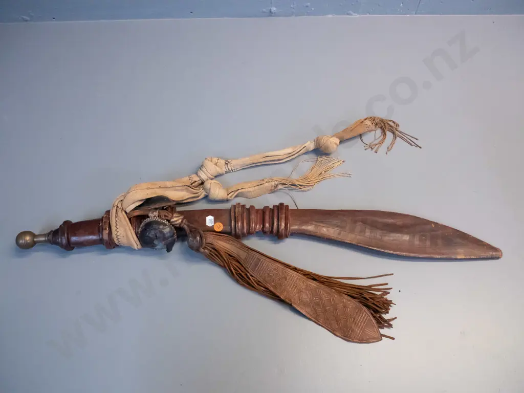 vintage scimitar style sword and leather sheath with brass cap, woven fabric straps - corrosion to blade and wear to Image 1++
