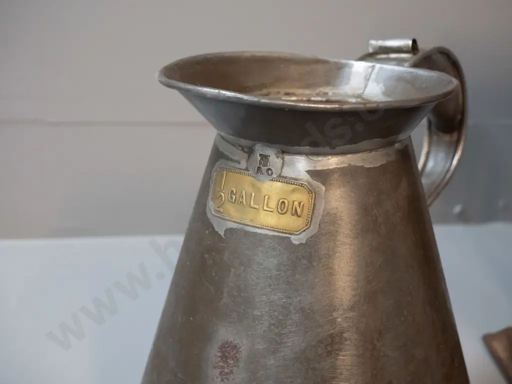 vintage tin half gallon jug with brass label, some dents, and a candle mould/makerH-270 W-200 D-150 Image 1++