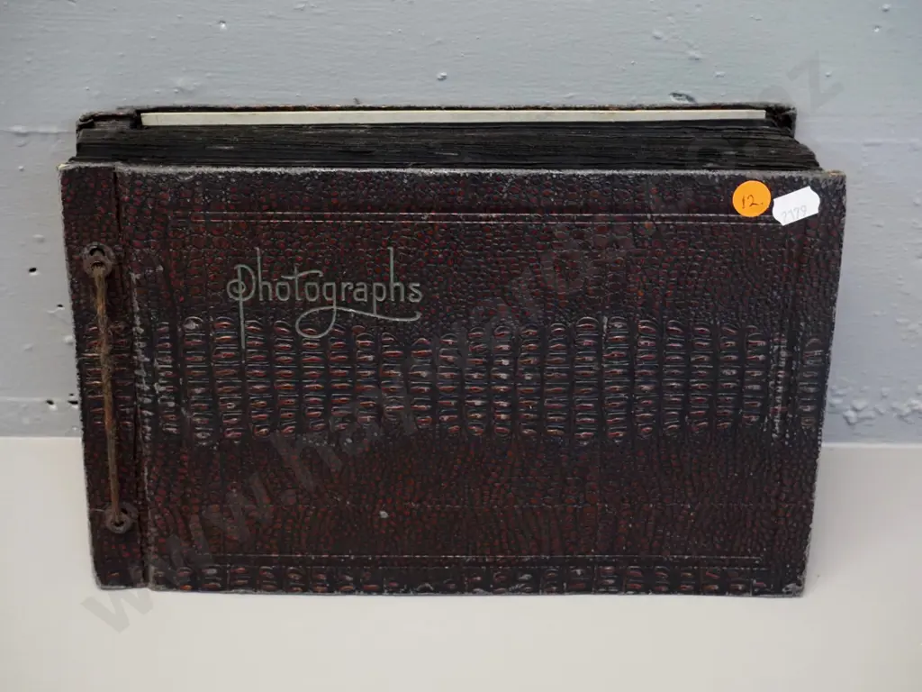 vintage photo album containing numerous Napier earthquake photos, central Otago, Dunedin, Queenstown etc. Image 1++