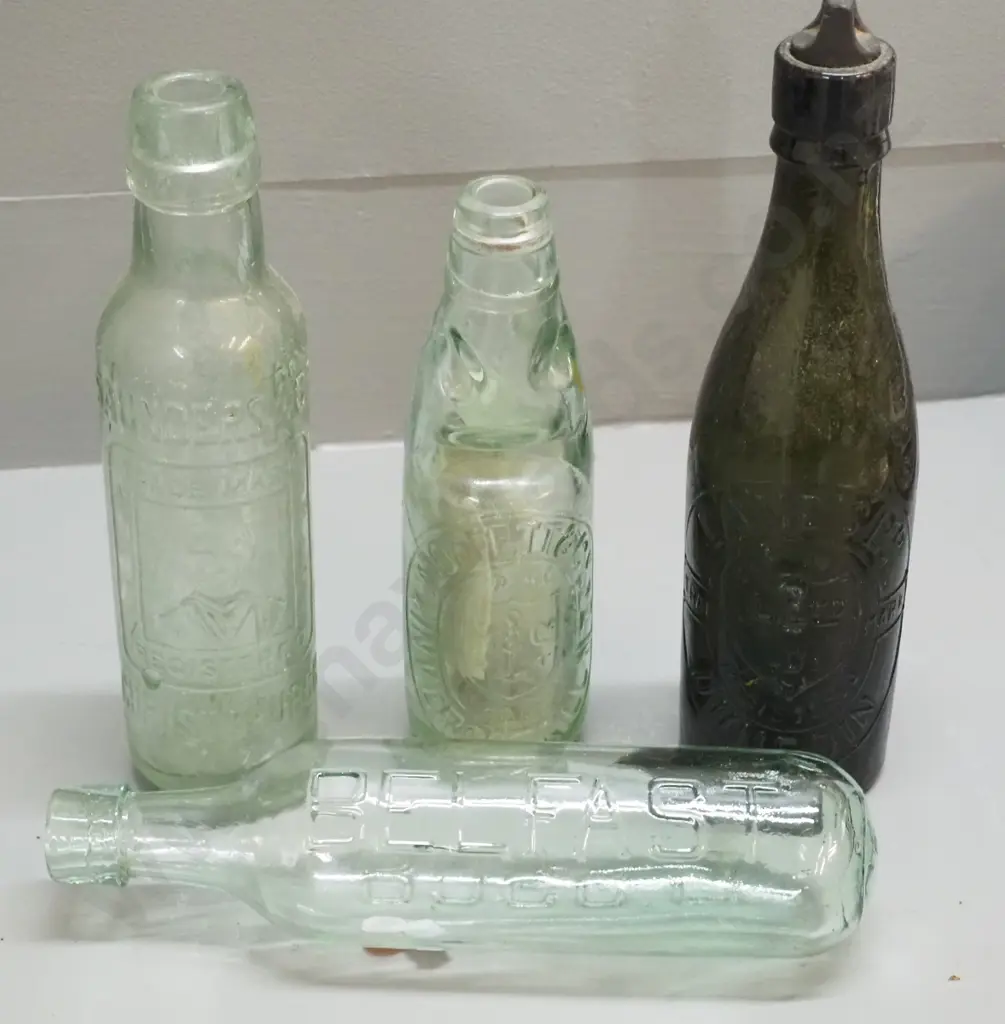 4 vintage drink bottles: Lane's Dunedin w/small chip at rim, bakelite screw stopper, Moffett & Co Invercargill, Saunders Image 1++