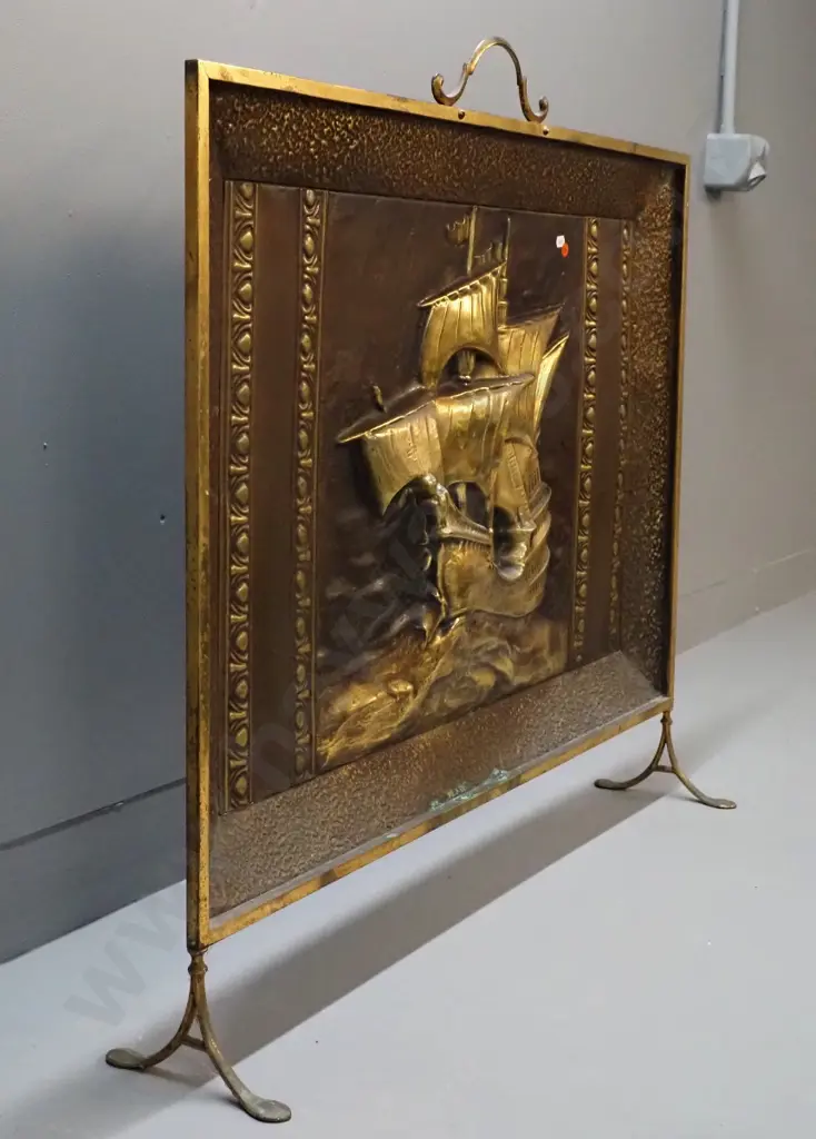 deco beaten brass galleon motif large fire screen with scroll handles and feet, some verdigris. Marked Myttons, Made in Image 1++