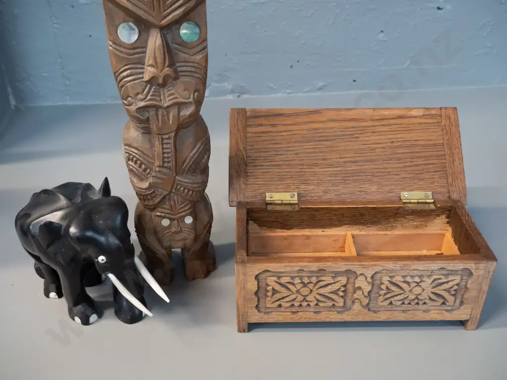 carved timber Maori souvenir figure w/ paua inserts H-250, small English carved oak box & an ebony elephant Image 1++