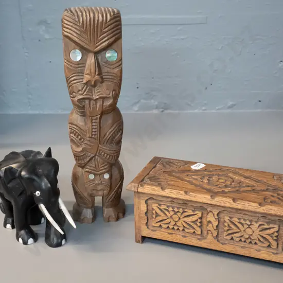 carved timber Maori souvenir figure w/ paua inserts H-250, small English carved oak box & an ebony elephant