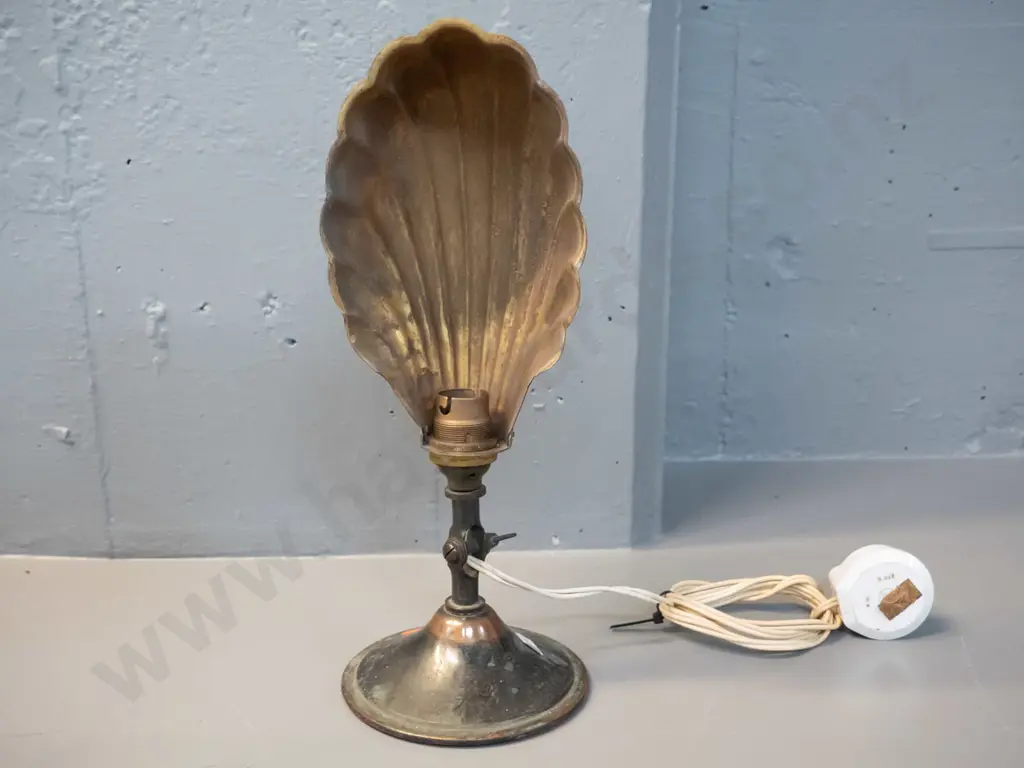 vintage brass lamp with shell-shaped shade, tilting stem for wall or table use - base has been weighted. H300 Base D115 Image 1++