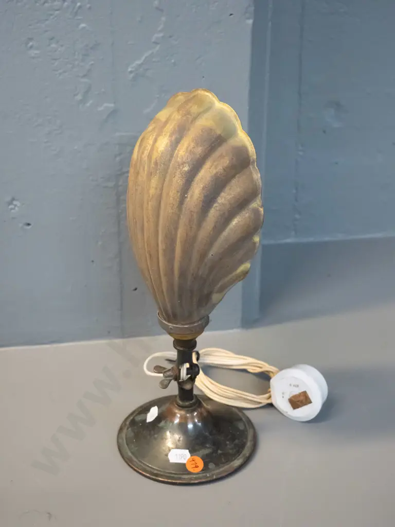 vintage brass lamp with shell-shaped shade, tilting stem for wall or table use - base has been weighted. H300 Base D115 Image 1++