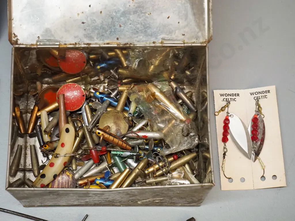 tin box of fishing lures and weights and assorted other fishing or fly tying items - tin H-100 W-170 D-120 Image 1++