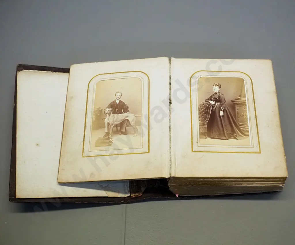 Victorian photo album with numerous photos, no dates or names, in tooled leather album, coming apart slightly H155 W115 Image 1++