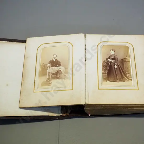 Victorian photo album with numerous photos, no dates or names, in tooled leather album, coming apart slightly H155 W115