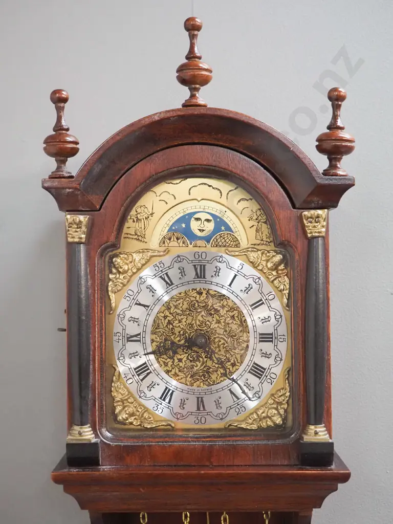 Dutch wall clock in ornate wooden case with 2 heavy brass weights, with moon phase dial, chipping to paint on grille on Image 1++