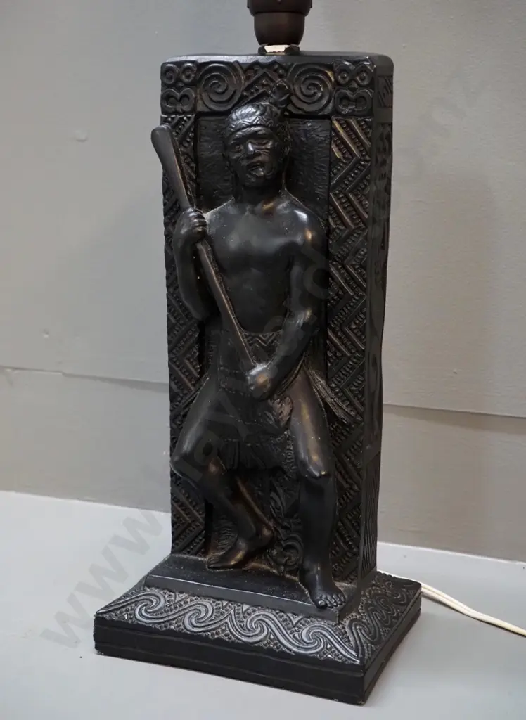 black painted plaster table lamp with Maori warrior relief motif, textured glass with chrome lamp holder. Chip to finish Image 1++