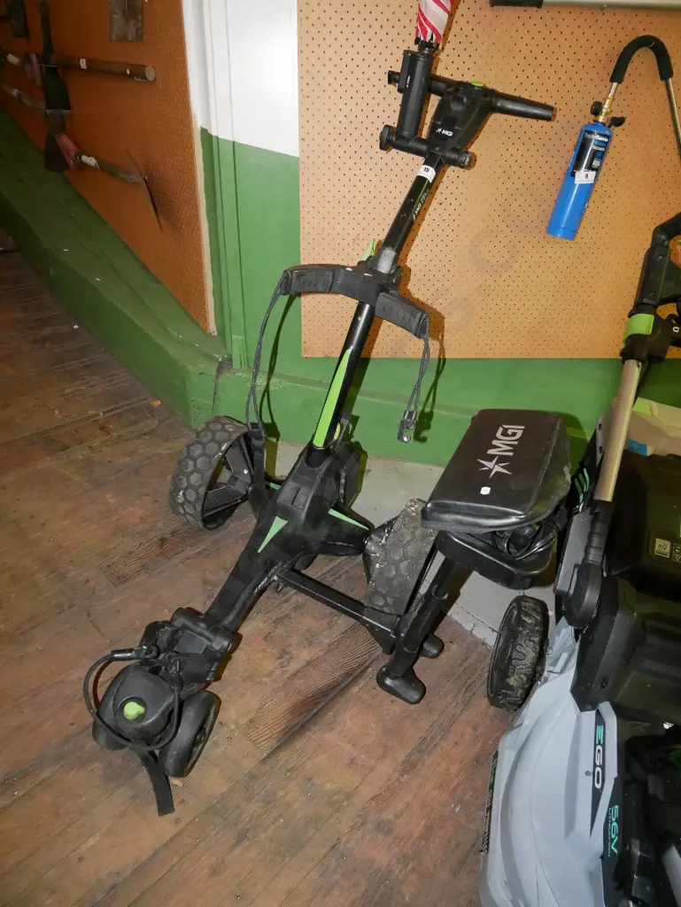 MGI battery powered golf trundler with charger and umbrella Image 1++