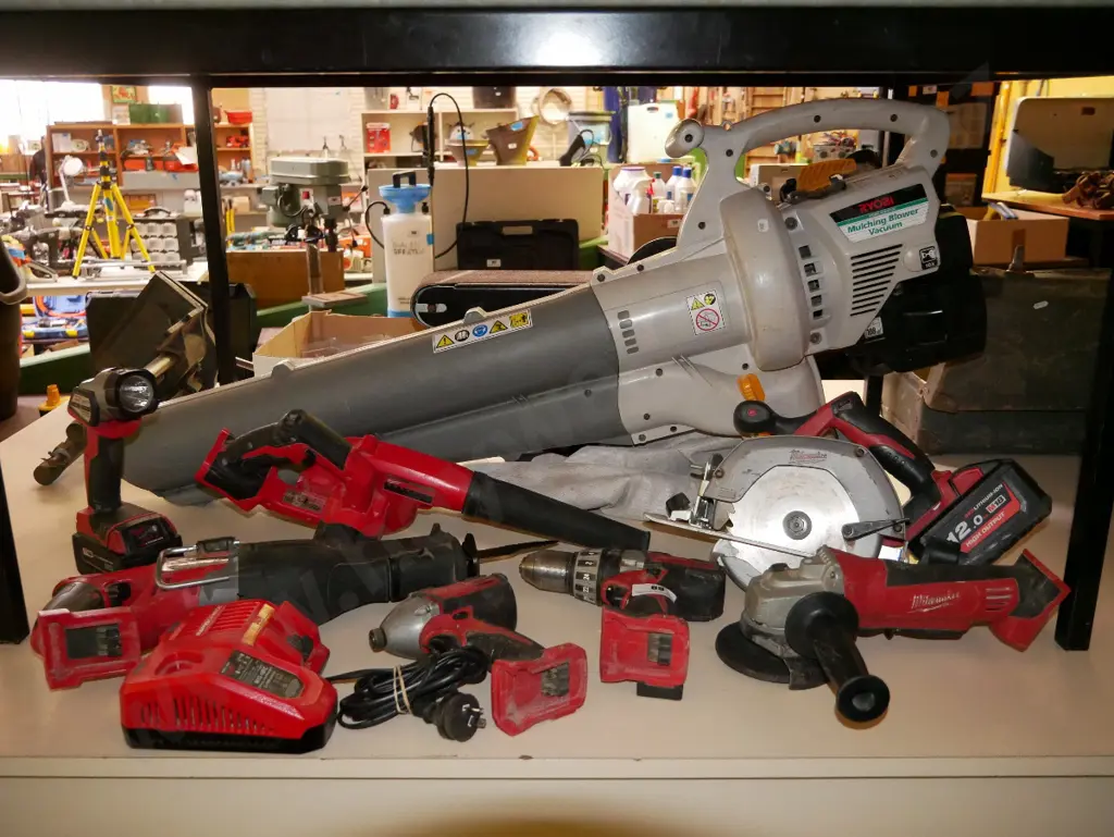 Milwaukee battery powered tool set; torch, blower, skilsaw, impact driver, drill, grinder Image 1++