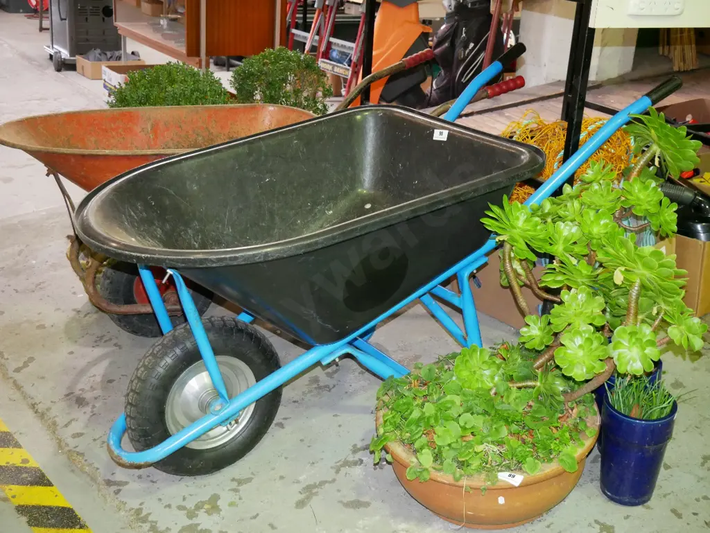 black plastic contractors wheelbarrow Image 1++