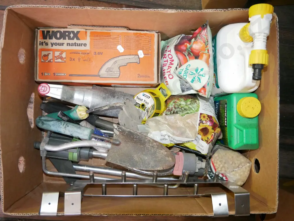 box; sprinklers, garden chemicals, battery powered buxus pruners etc Image 1++