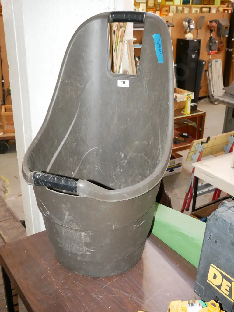 black plastic wheeled garden implement carrier Image 1++