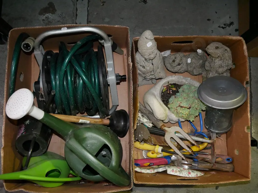 2 boxes of gardening accessories; hose, watering can etc- green dots Image 1++