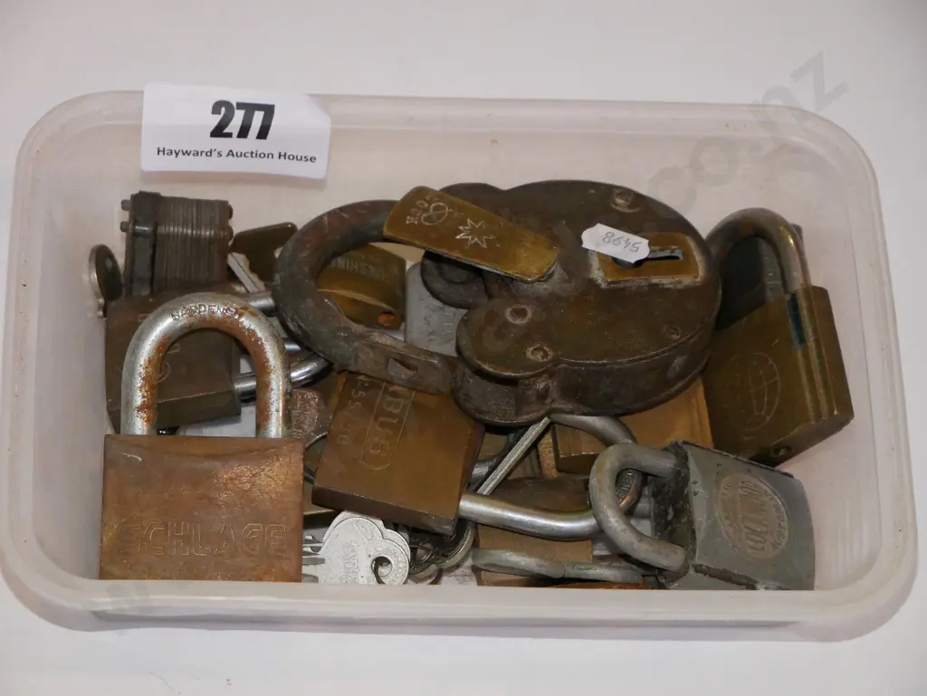 tub of various padlocks and keys Image 1++