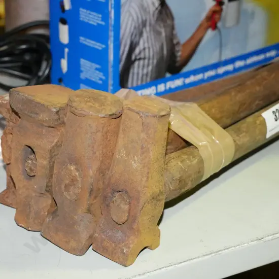 bundle of wooden handled vintage blacksmith's hammers
