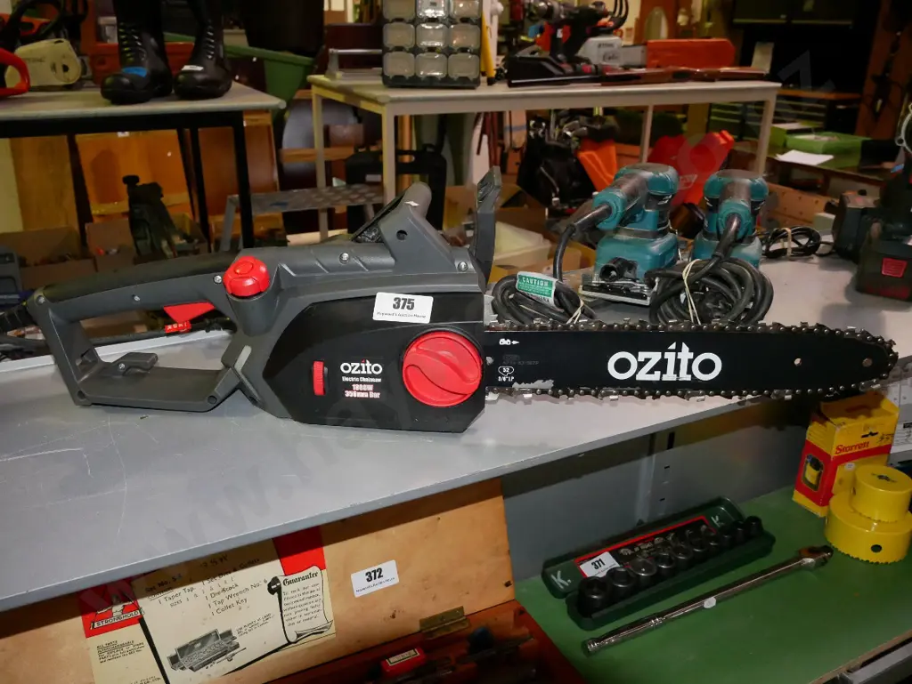 Ozitio electric chainsaw Image 1++