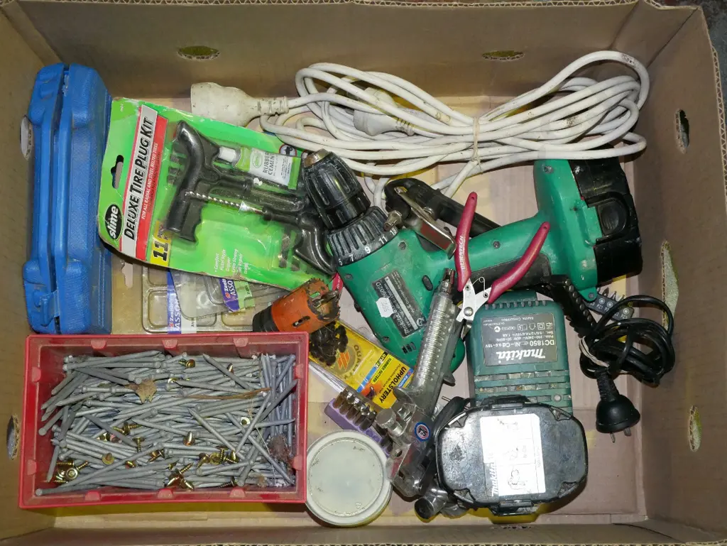 box; battery drill, tyre plug kit, extension cord etc Image 1++